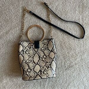 Elegant Snakeskin Crossbody Bag with Gold Ring Handle
